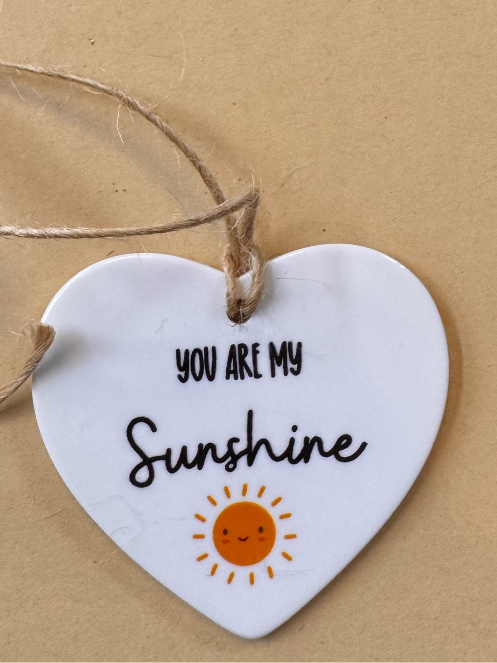 Heart-Shaped Ceramic “You Are My Sunshine" Tag — White with Orange Sun